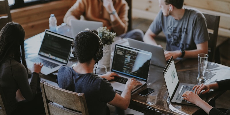 Team members collaborating around a table