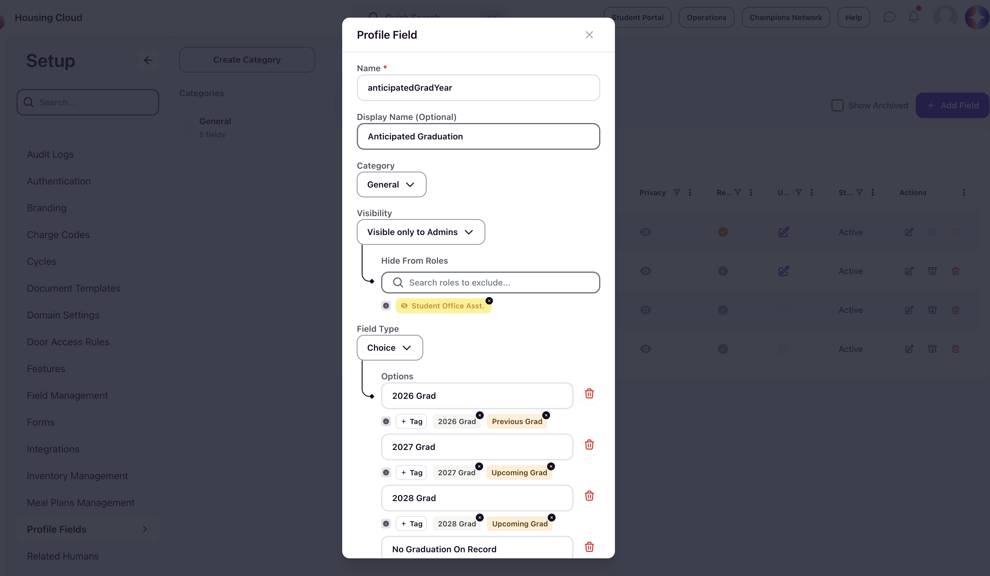 Profile Field modal showing a Choice field with Options for graduation years, each with assigned tags, plus Hide From Roles and Fallback Value settings