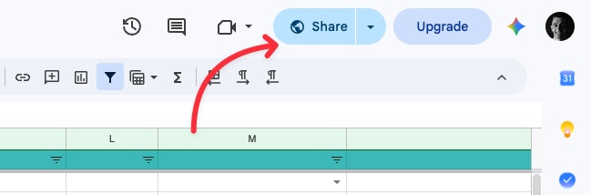 Google Sheets top-right toolbar showing the Share button highlighted by a red arrow