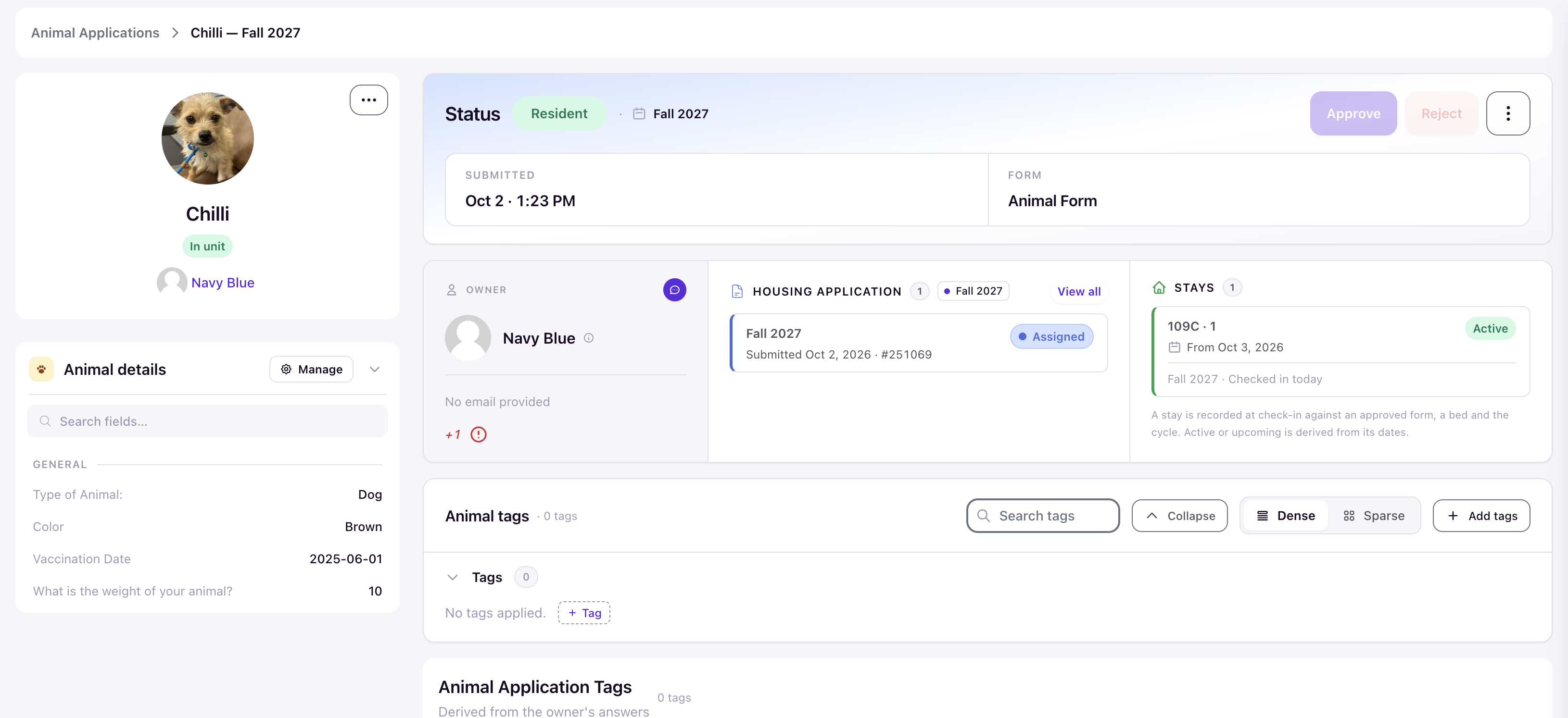 The animal application after check-in, showing the Resident status and the active stay