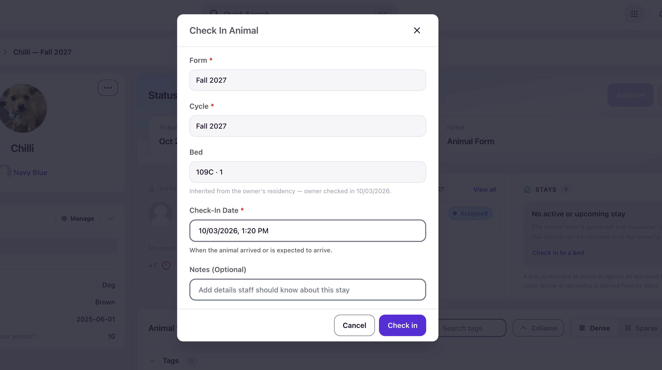 The Check In Animal dialog showing the inherited bed, the pre-filled check-in date, and optional notes