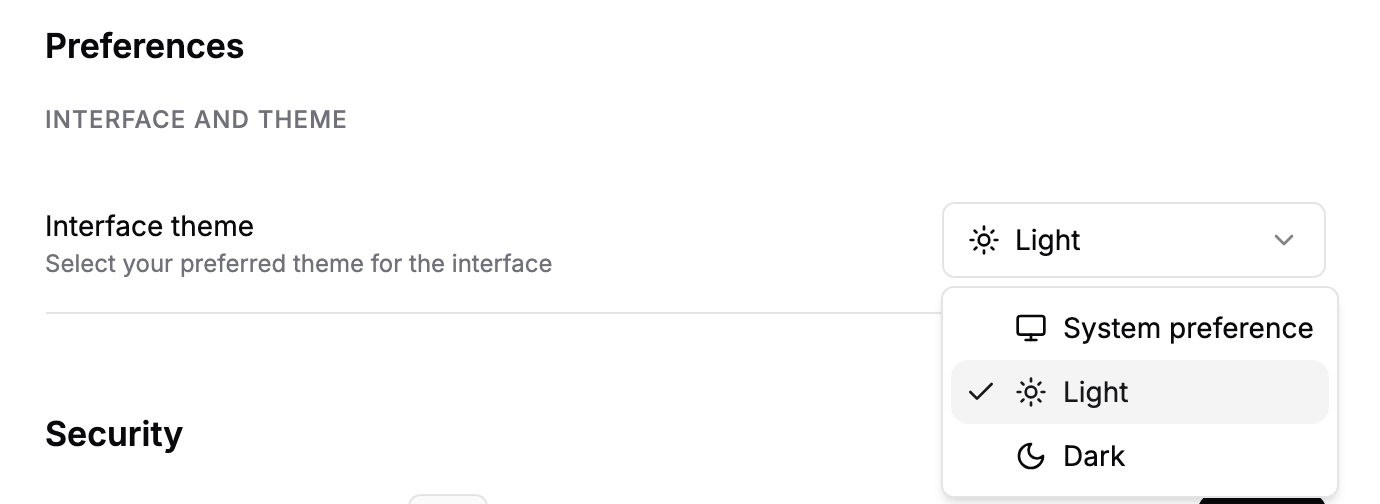 The Interface theme menu open, offering System preference, Light and Dark.
