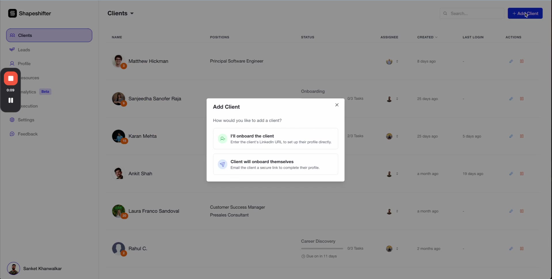 A screenshot of a web application interface, specifically a client management dashboard. The left sidebar shows navigation options like Clients, Leads, Profile, Resources, Analytics, Execution, Settings, and Feedback. The main content area displays a list of clients, each with a profile picture, name, position, status, assignee, creation date, last login, and actions. Several clients are visible, including Matthew Hickman, Sanjeedha Sanofer Raja, Karan Mehta, Ankit Shah, Laura Franco Sandoval, and Rahul C. A modal dialog box titled Add Client is overlaying the main content. This modal asks How would you like to add a client? and presents two options: I'll onboard the client (with a prompt to enter their LinkedIn URL) and Client will onboard themselves (with a prompt to email them a secure link). The cursor is hovering over the + Add Client button in the top right corner.