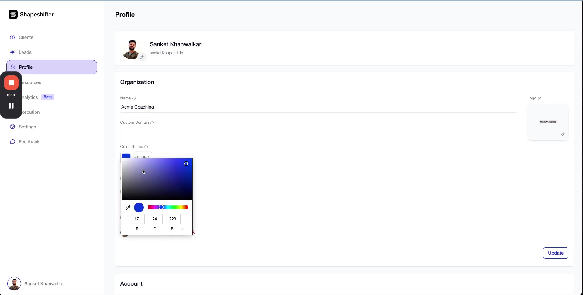 A screenshot of a web application's profile settings page. The left sidebar shows navigation links such as 'Clients', 'Leads', 'Profile' (currently selected), 'Resources', 'Analytics Beta', 'Execution', 'Settings', and 'Feedback'. The main content area displays the user's profile, including their name 'Sanket Khanwalkar' and email 'sanket@superkit.io'. Below this, the 'Organization' section shows the organization name as 'Acme Coaching' and a placeholder for 'Custom Domain'. A color theme picker is visible, displaying a color palette and RGB values (17, 24, 223). The right side shows a placeholder for a logo with the text 'Shape Coaching'. An 'Update' button is present at the bottom right of the main section. A timestamp overlay '0:39' with play/pause controls is present on the left sidebar, obscuring parts of the 'Resources' and 'Analytics Beta' links.
